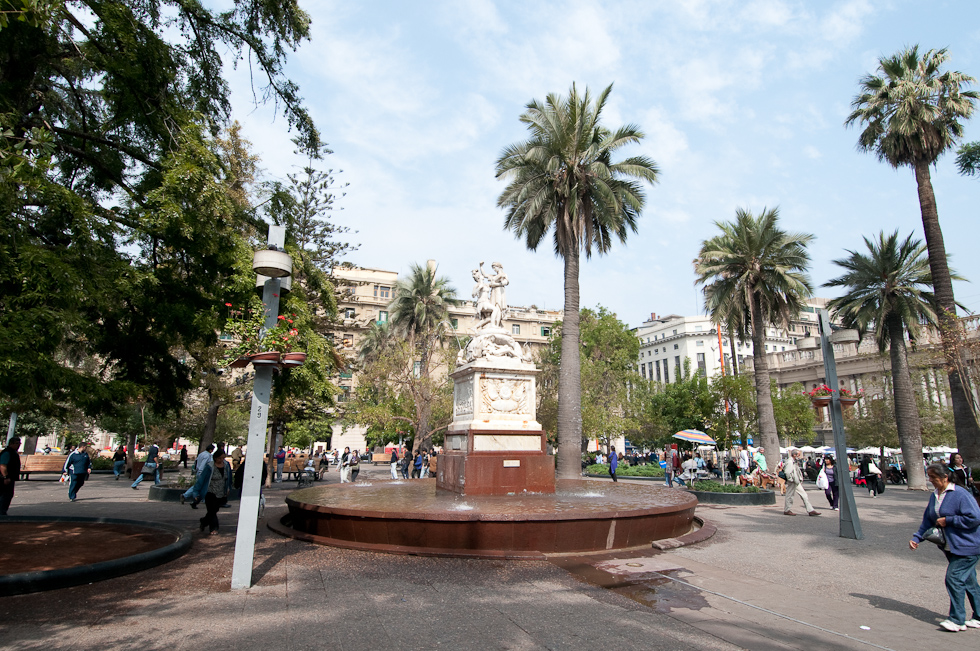 The Town Square is used as the center for maps.  This would make this statue and fountain the center of town.   Plaza de Armas, Santiago, Chile